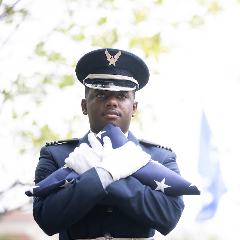 University of Memphis rotc student raising flag