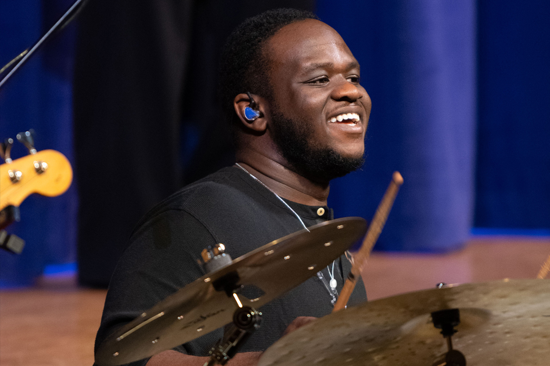 Student playing drums