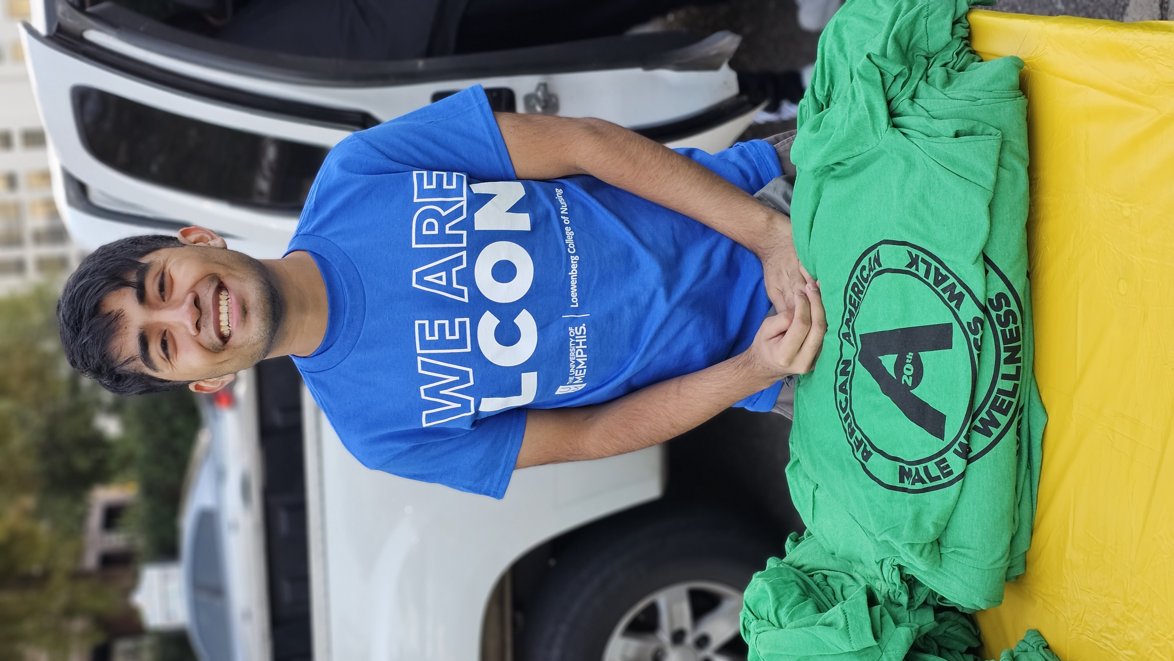 student giving shirts student giving shirts