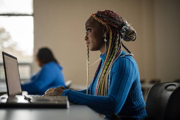 student at laptop