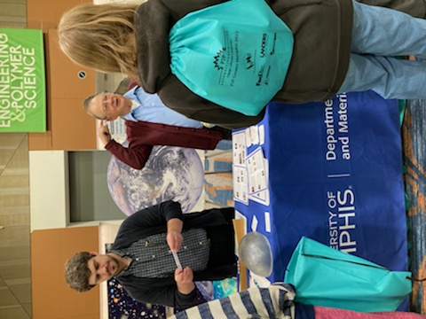 Emeritus Professor Robert "Bob" Marchini and Dr. Gustav Borstad talking with students.