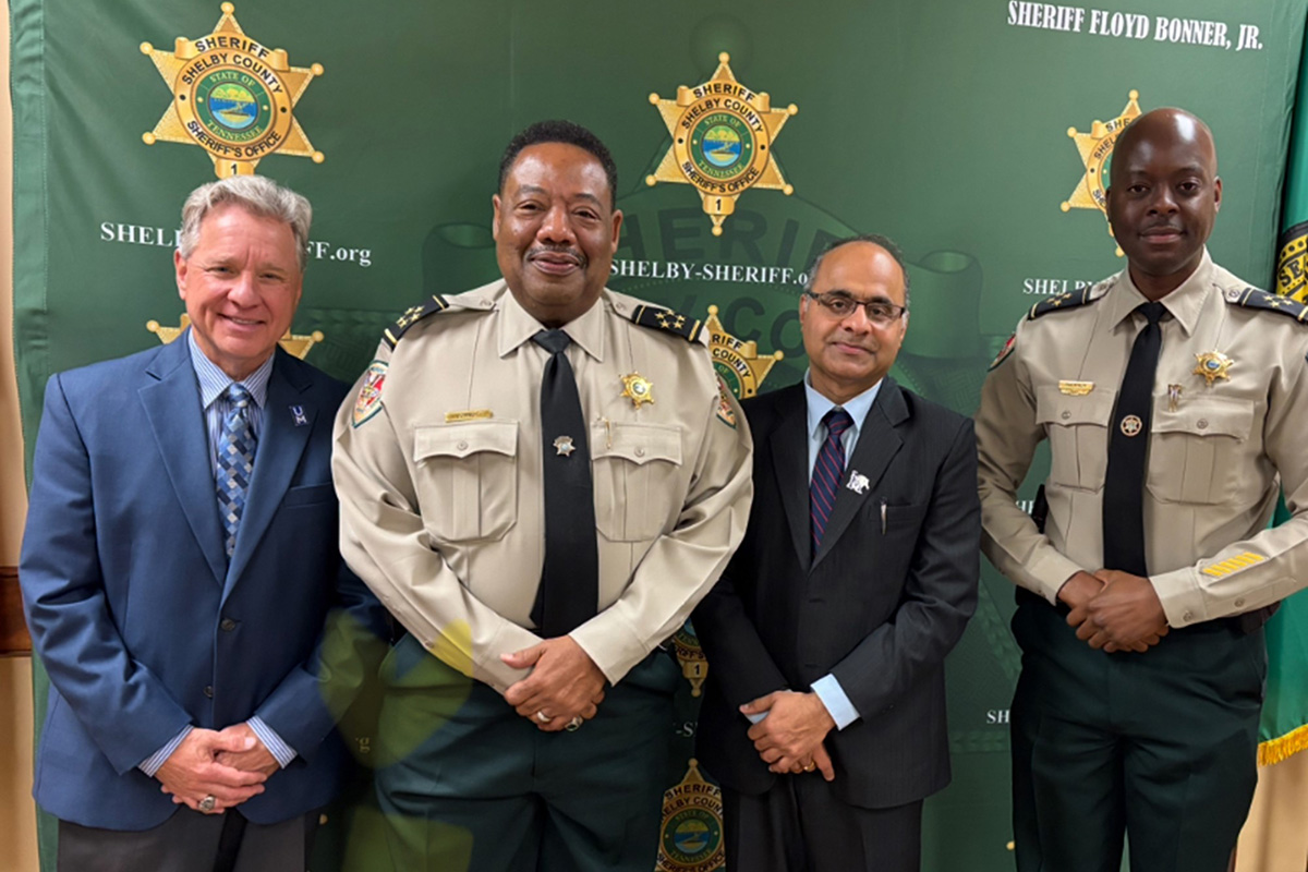 Dean Joshi, surrounded on the left by Sheriff Floyd Bonner and on the right by Chief Deputy Anthony Buckner as well as Community Outreach Representative Steve Shular