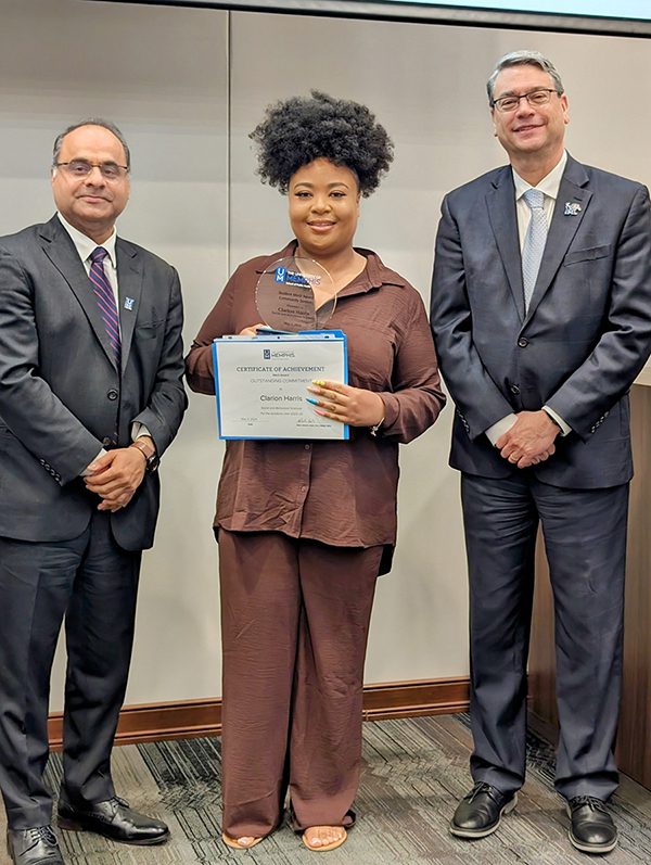 Clarion Harris receiving Award