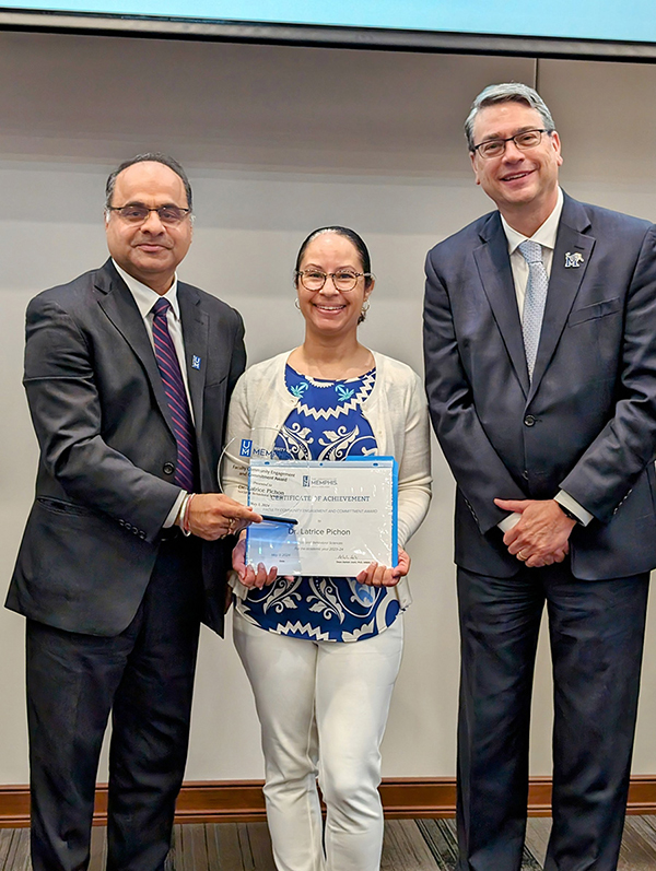 Latrice Pichon receiving Award