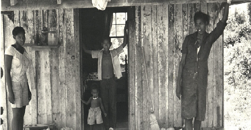 Children standing outside Fayette County home