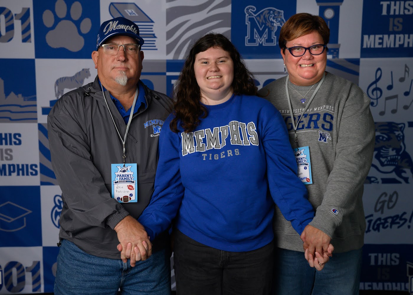 Richard and Cheryl DeLisio posing with their daughter Gianna in the middle. They are the 2024 family of the year.