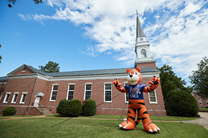photo of past UofM magazine cover and interior spread