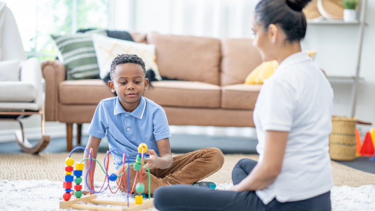 Graduate student in play therapy degree program