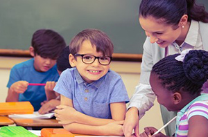 teacher with children in classroom