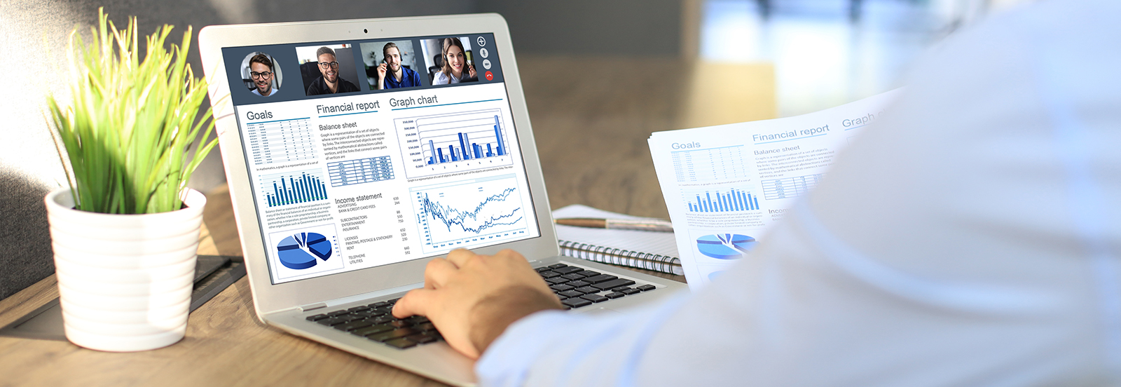 online student working on computer with charts and data on the screen