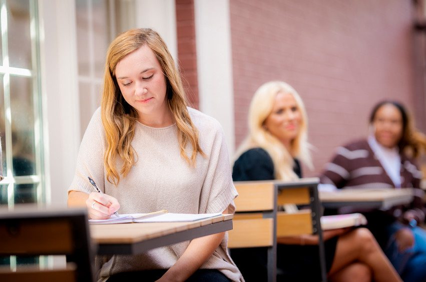 psychology student taking notes