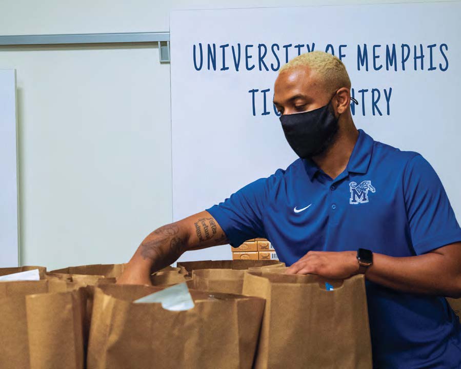staff packaging bags of food