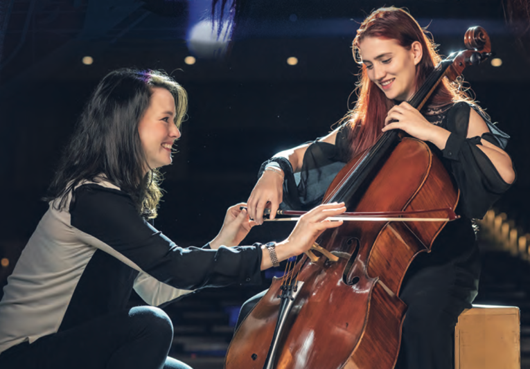 Kimberly Patterson and Wali playing Cello