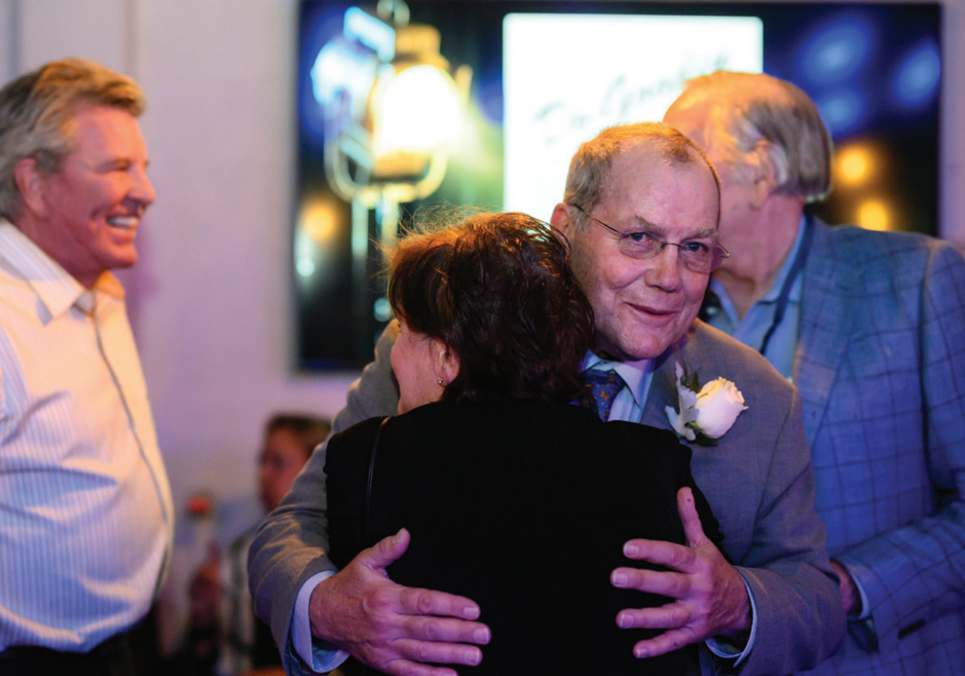 james r humphrey hugging someone